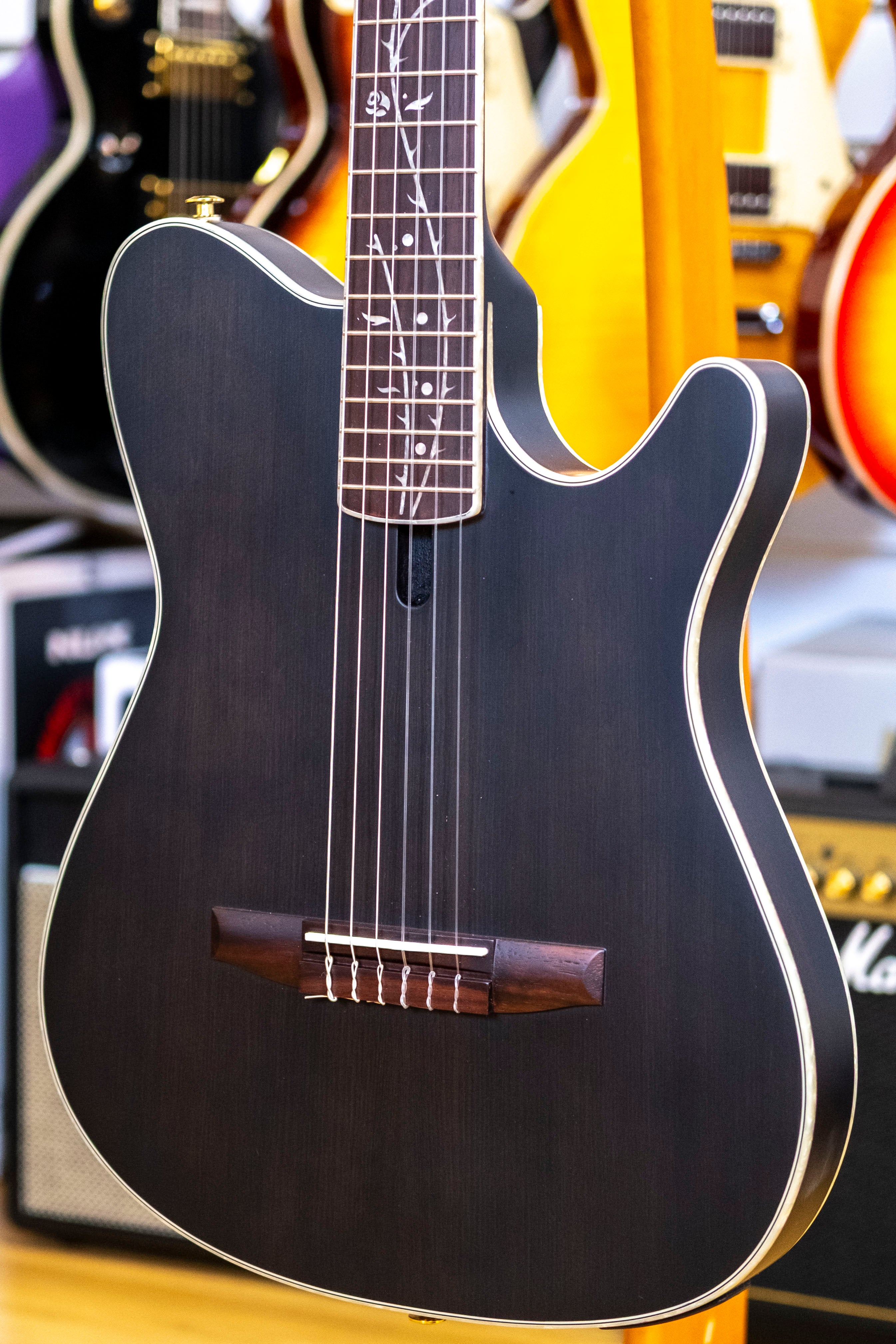 Ibanez TOD10N Tim Henson Signature Acoustic Electric Nylon String Guitar (Transparent Black Flat)